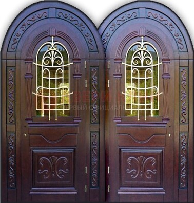 Индивидуальная арочная дверь со стеклом и ковкой ДА-19 в Луховицах