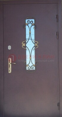 Металлическая дверь со стеклом и ковкой ДСК-77 в Санкт-Петербурге